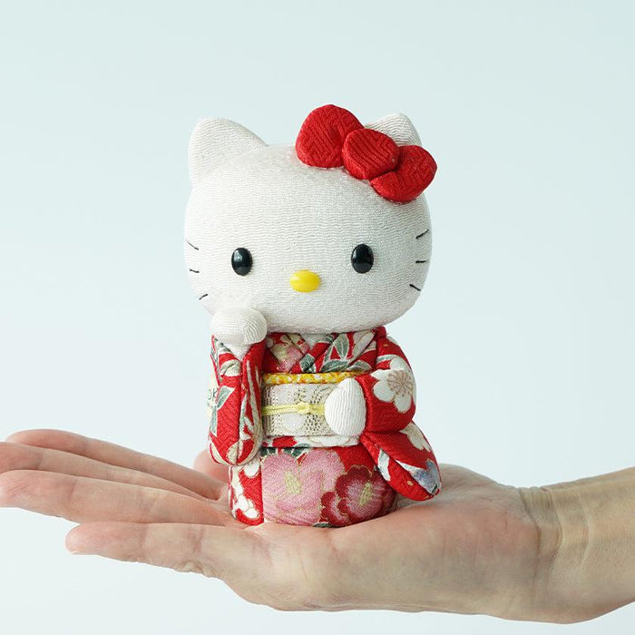 Hello Kitty lucky cat doll in red floral kimono held in hand | Edo art dolls, Kakinuma Dolls