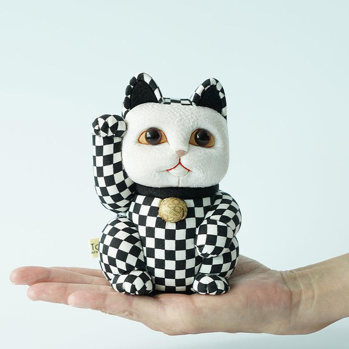 Black-and-white checkered maneki neko lucky cat Edo art doll held in hand | Kakinuma Dolls, Japan