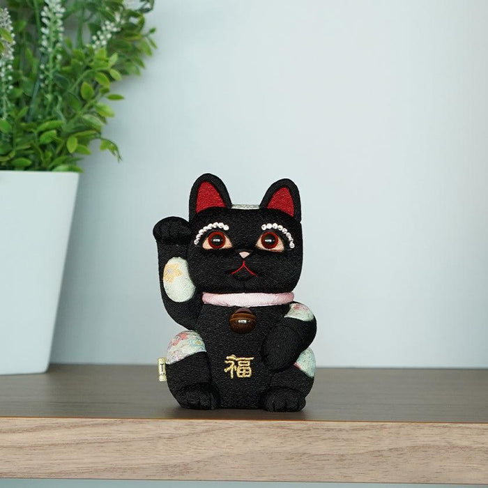 Black maneki neko lucky cat figurine with raised paw and fuku emblem | Edo art doll, Kakinuma Dolls