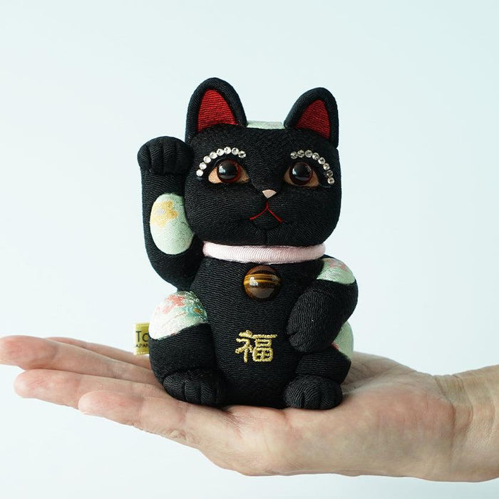 Black maneki neko lucky cat fabric doll held in hand | Edo art dolls, Kakinuma Dolls