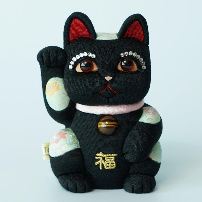 Black maneki neko lucky cat figurine with rhinestone eyes and gold fuku symbol | Edo art dolls, Kakinuma Dolls