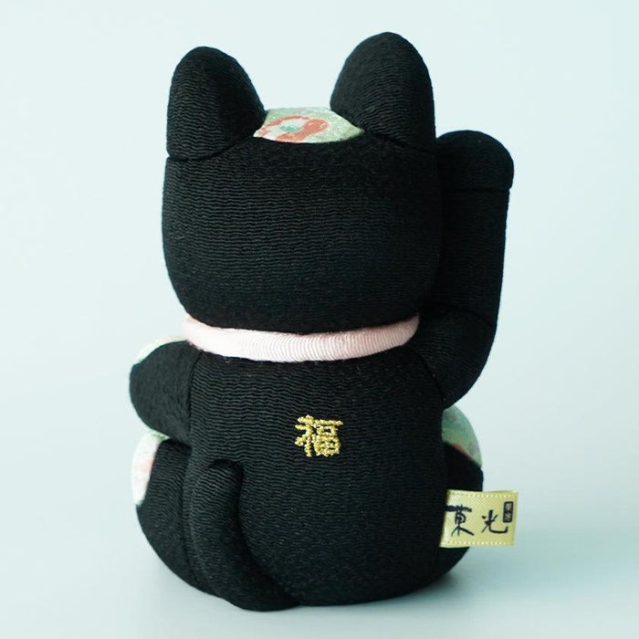 Black fabric maneki neko lucky cat doll with gold fuku embroidery, raised paw | Edo art doll, Kakinuma Dolls