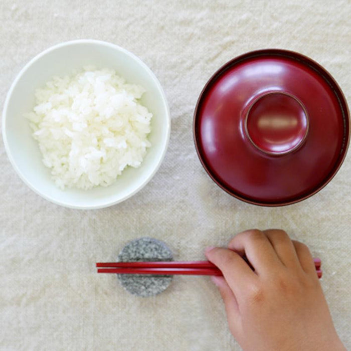 Aji stone chopstick rest holder on a Japanese table setting with red lacquer bowl | Kagawa, aeru