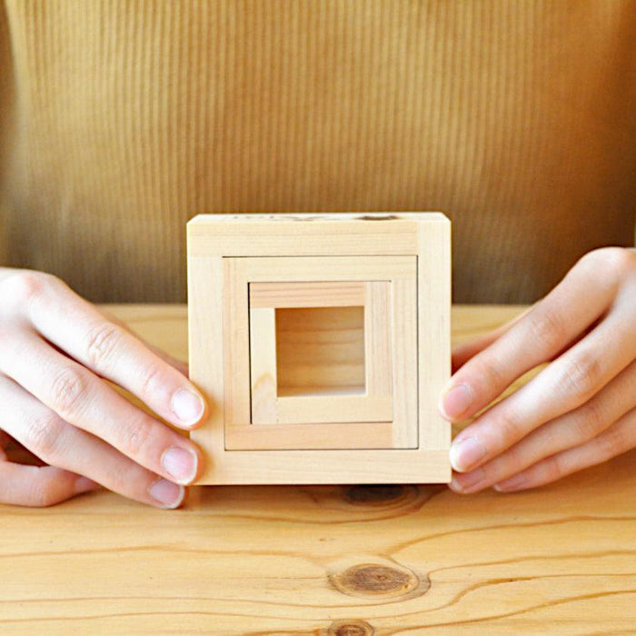 Wooden Japanese masu (3 pieces set) held in hands on pine table | J.Flavor × Ohashi, Japan