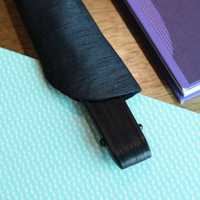 Close-up of the pivot and black fabric cover of a Nagoya folding fan | Aichi, SUEHIRODO