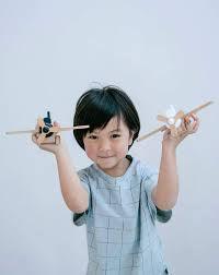 kiko + Gg Wooden Wind-up Propeller Plane Black.