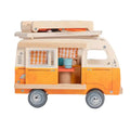 Wooden toy camper van with orange body and white top on a white background