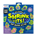 Shrink-Its DIY Shrink Art Kit packaging with colorful designs and text on a blue background.