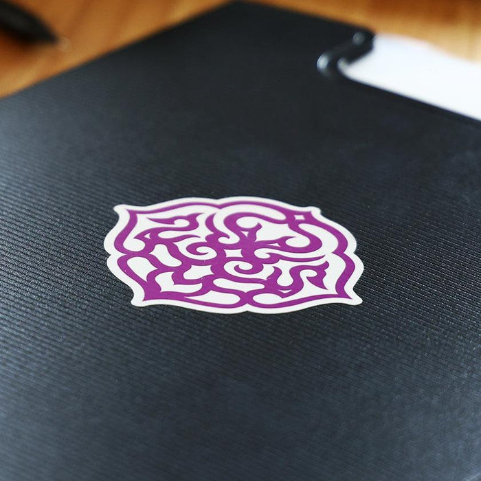 Ainu pattern sticker with purple traditional design on black surface | Hokkaido, CIKARPE AKAN