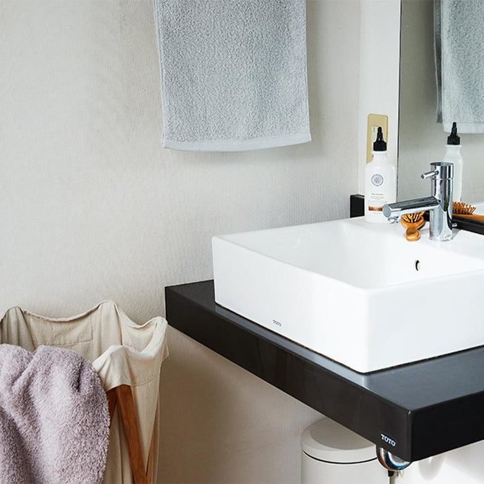 Gray Imabari face towels hanging in a modern Japanese bathroom | Imabari, sara-la
